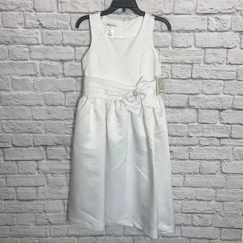 Bonnie Jean Girl's 12 1/2 White Pearl and Bow Layered Formal Dress